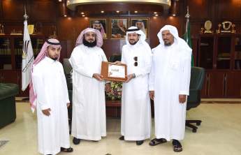 Rector receives the seventh annual report of the Deanship of Faculty Members and Staff Affairs